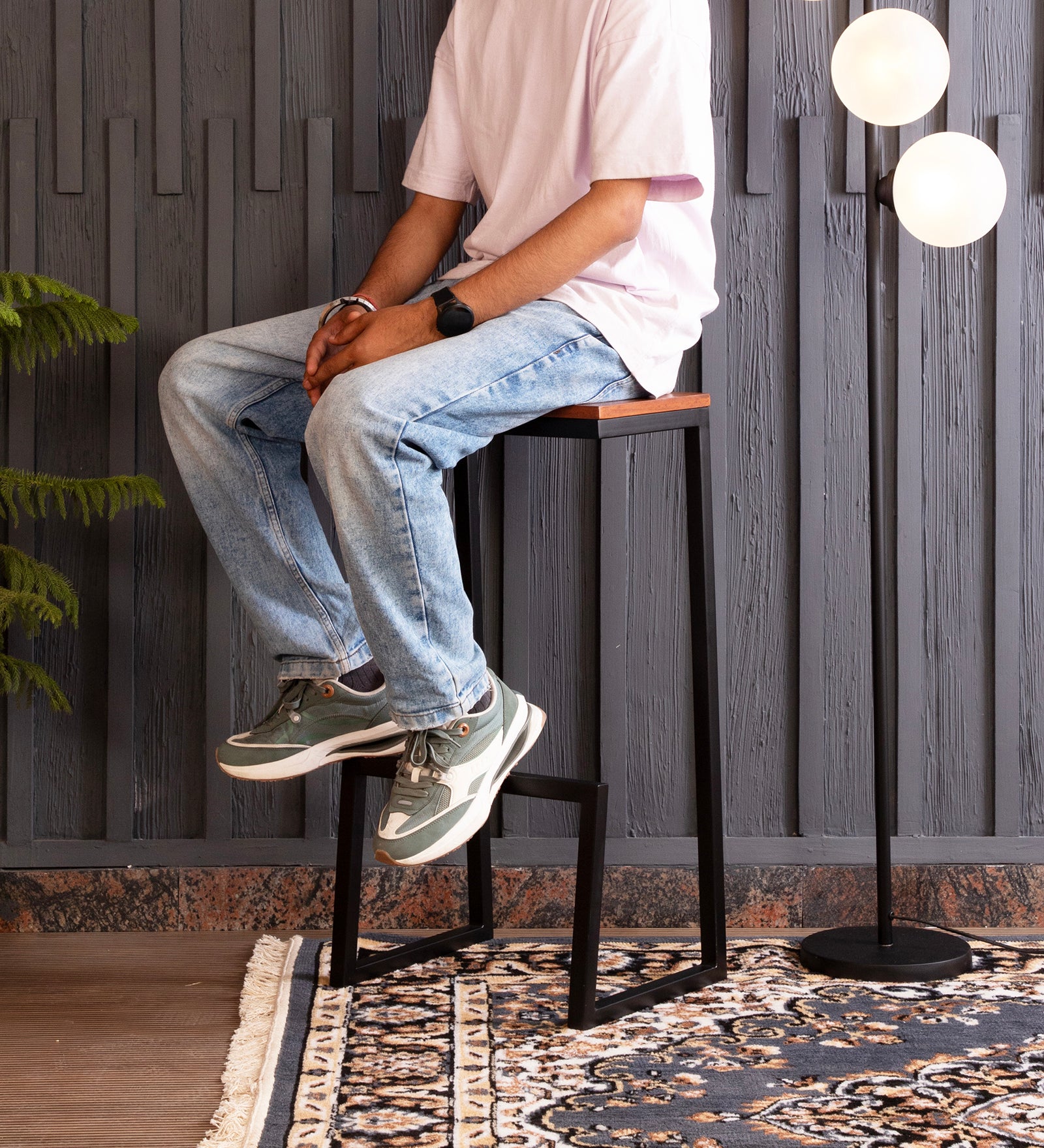 Fressia bar stool side profile showing teak seat and metal frame